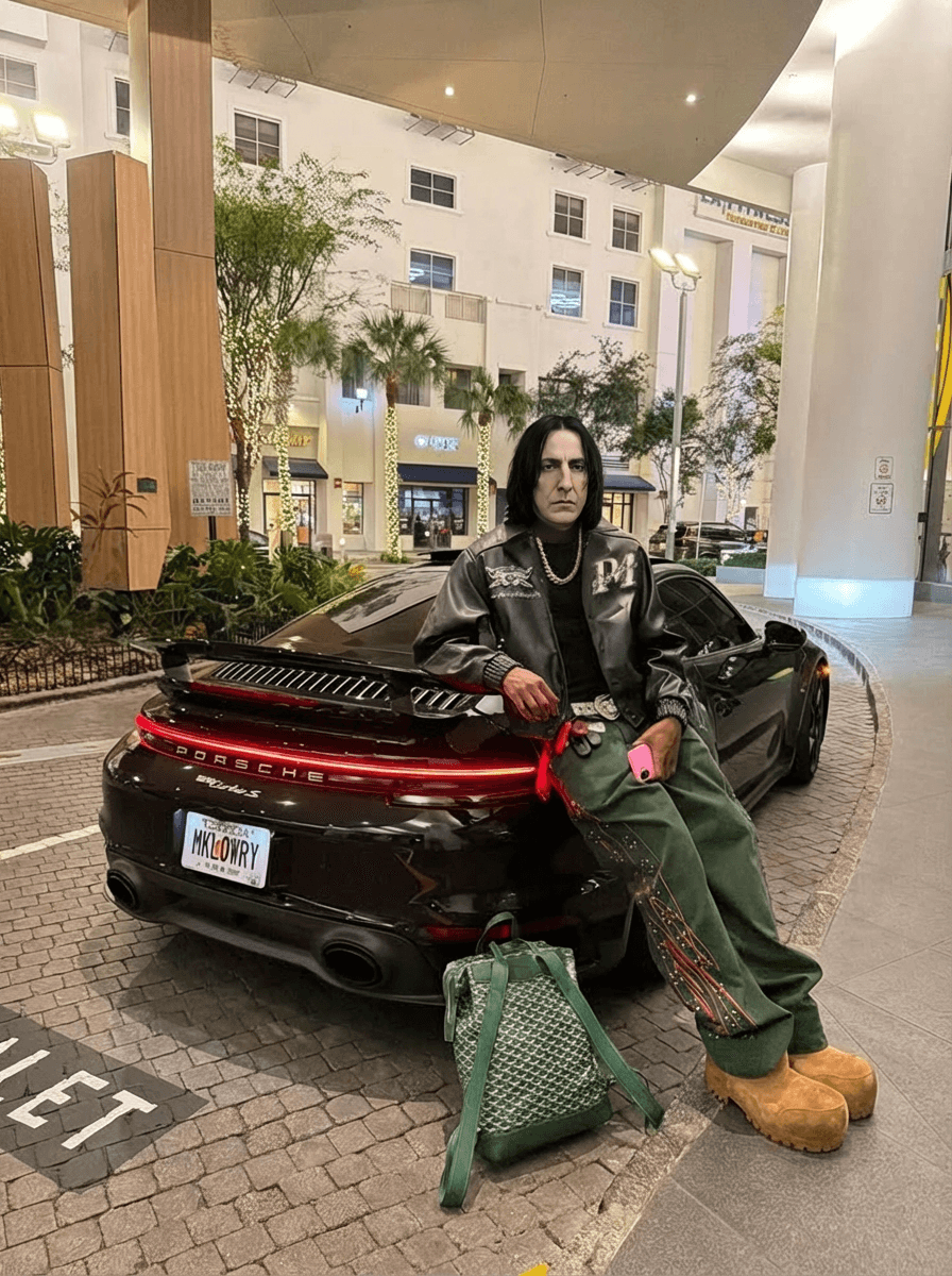 Use the provided image as the base reference.  Perform a high-precision character swap, replacing the original subject with Severus Snape (from Harry Potter) reimagined in a realistic human form.  STRICT RULES:  DO NOT change the outfit at all — keep the exact same clothing, accessories, textures, and fit (black leather jacket, green pants, boots, jewelry, sunglasses, beanie, bag). DO NOT change pose, body positioning, or hand placement. DO NOT change the environment — keep the Porsche car, lighting, background buildings, street, and composition identical. DO NOT change camera angle, depth of field, or framing.  Character Transformation Details:  Face must resemble Severus Snape: pale skin, long straight black hair (adapt naturally under the beanie), sharp facial structure, serious expression, slightly hooked nose. Maintain a stoic, emotionless, intimidating expression consistent with the character. Blend Snape’s facial features seamlessly into the body while preserving realism and lighting consistency.  Style Requirements:  Ultra-realistic photography (NOT cartoon, NOT CGI-looking) Natural skin texture, cinematic lighting Maintain original shadows and highlights Perfect facial integration (no distortion or mismatch)