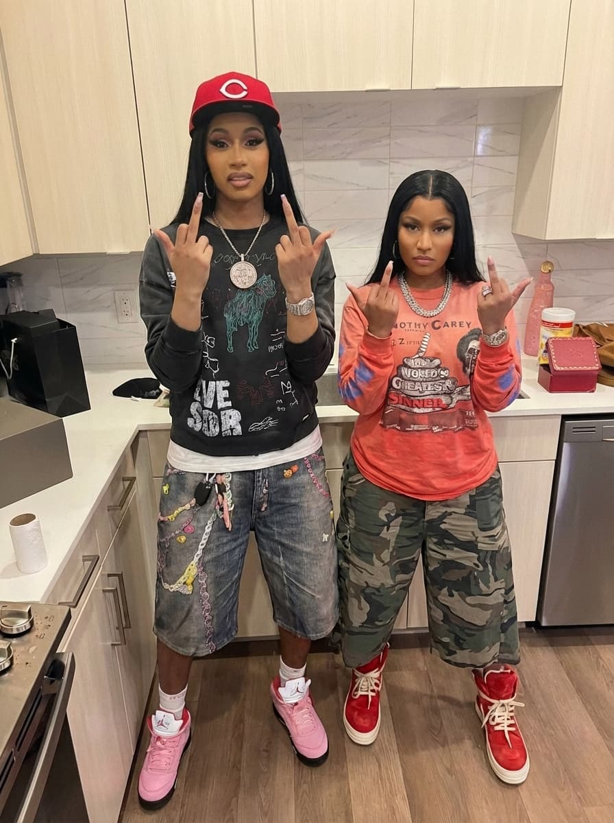 REPLACE MAN ON LEFT WITH CARDI B 
