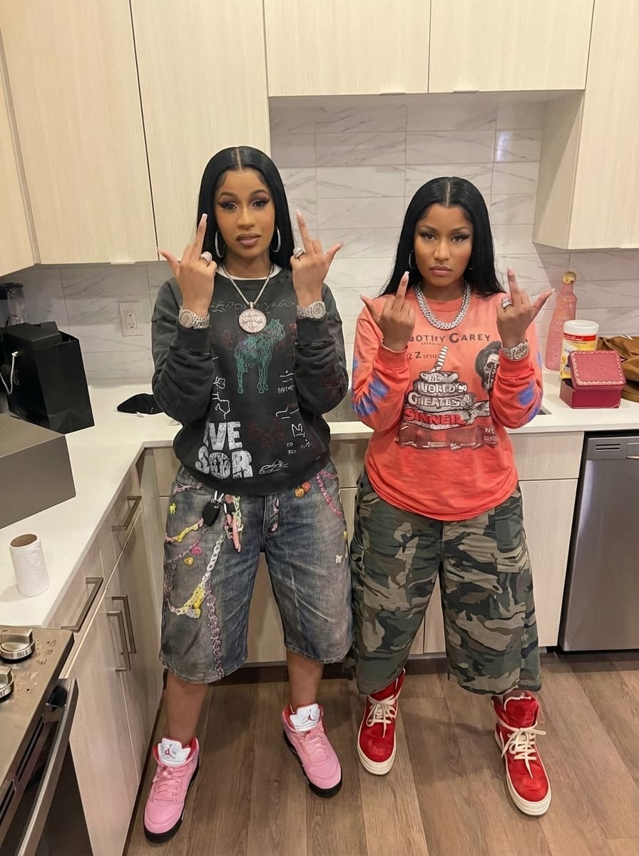 REPLACE MAN ON LEFT WITH CARDI B 