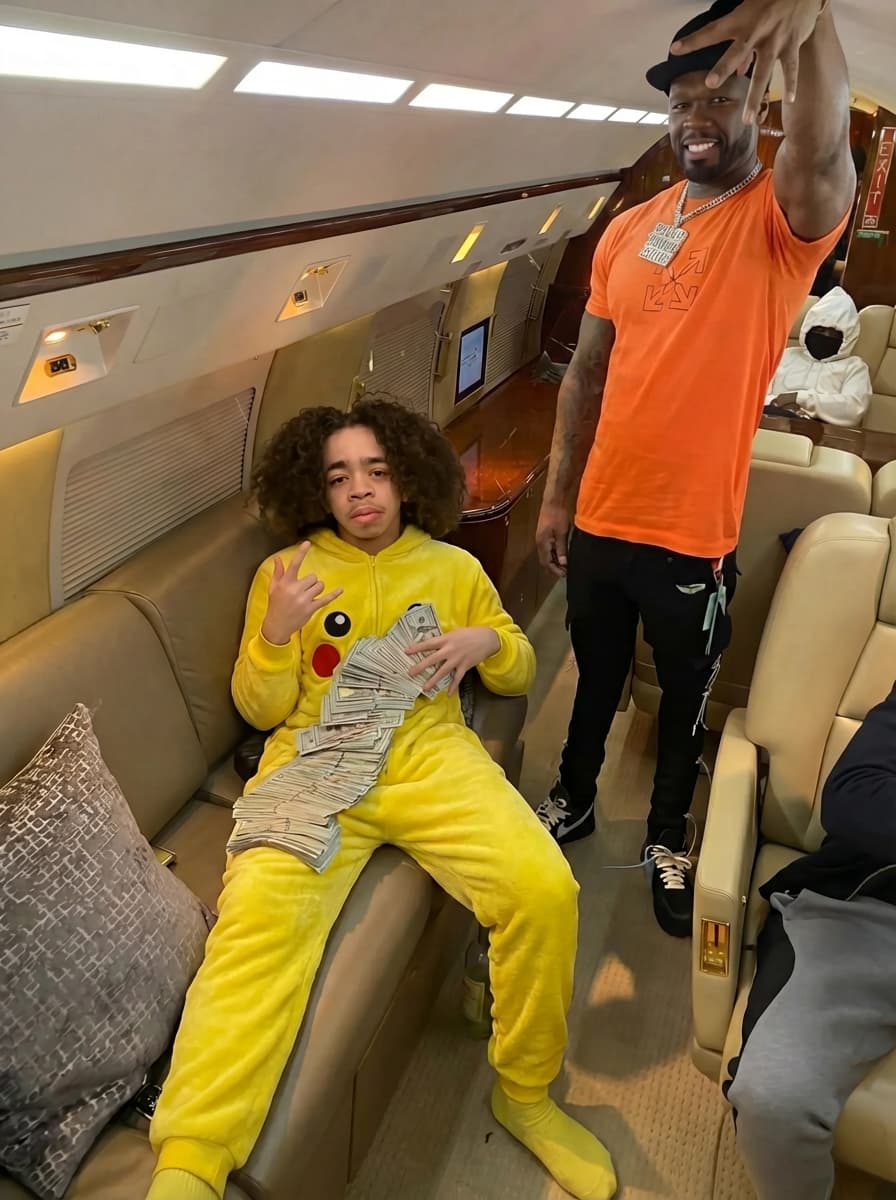 make the man in the orange skin match his face and make him more muscular like 50 cent the rappers size but keep him doing the same pose and keep the same vibe. do not alter his face 
