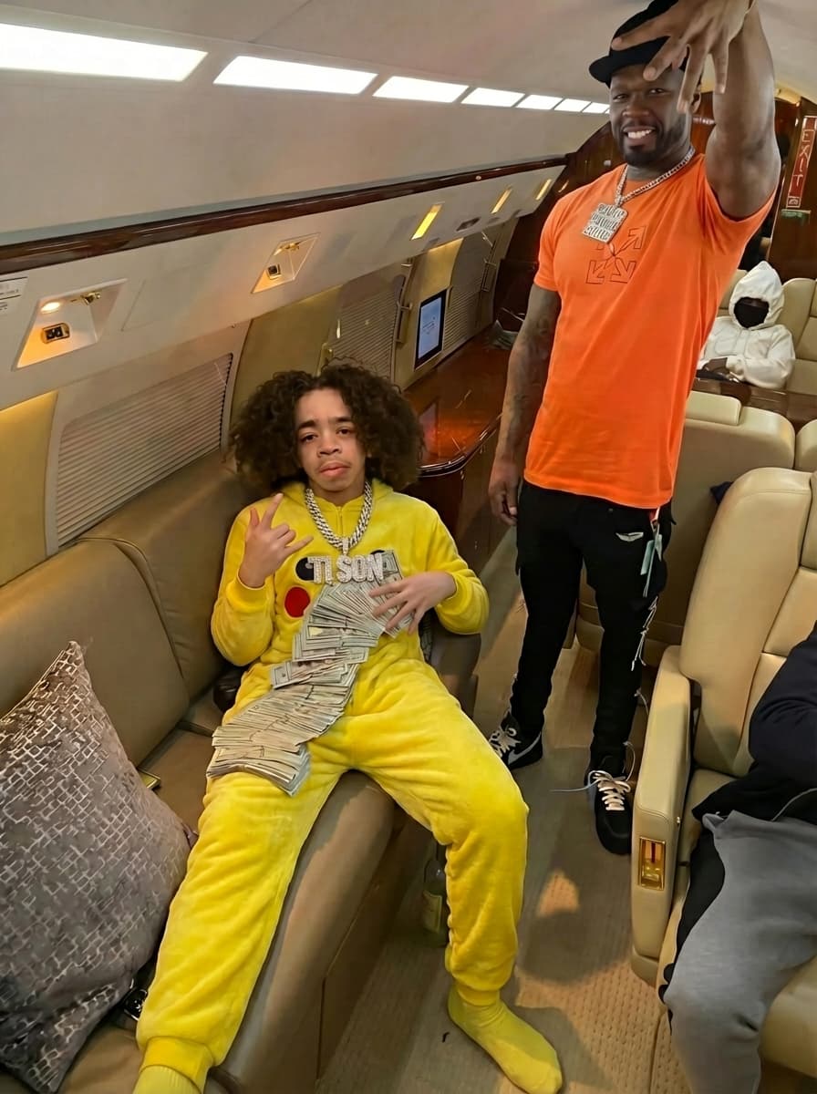 leave everything the same in this picture just edit the man in the yellow to have on a nice diamond chain that reads TI SON 