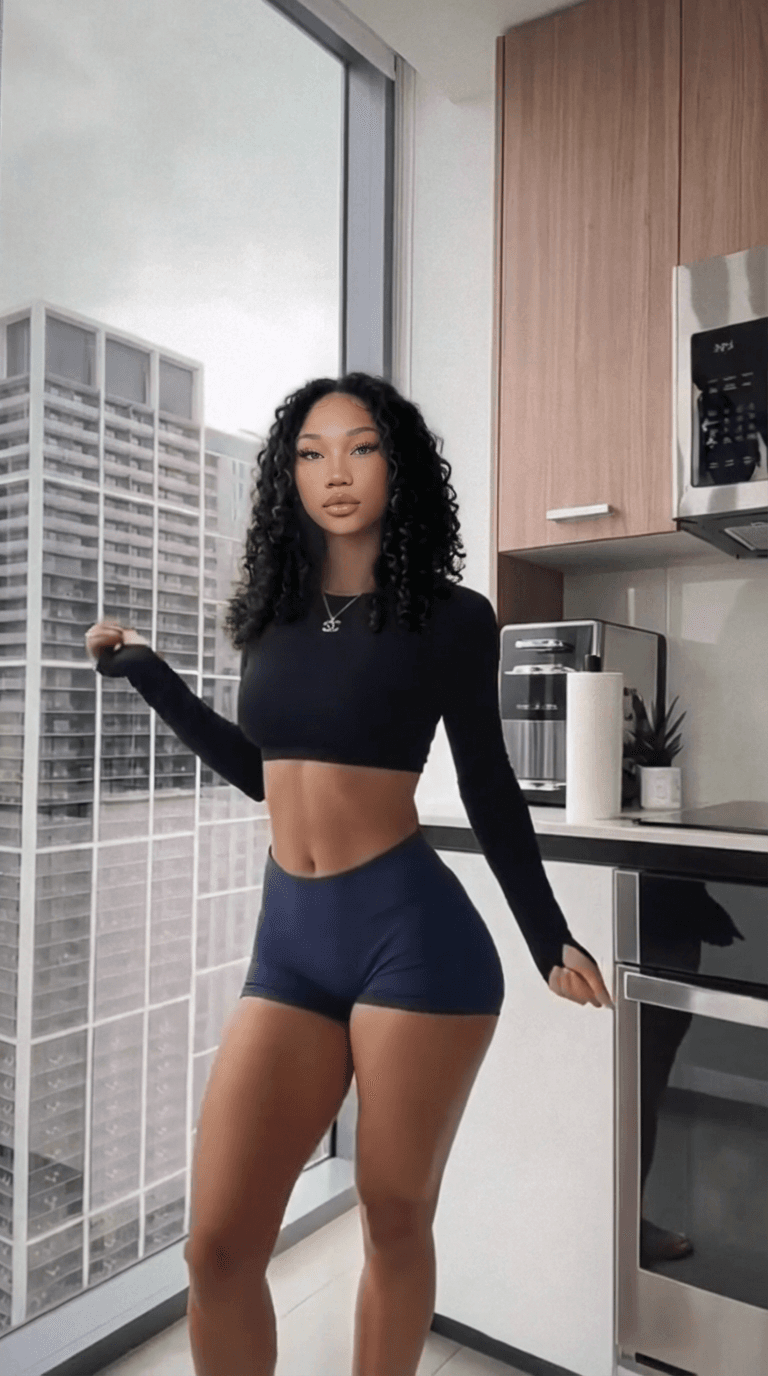 replace the face and skin tone of the curly black-haired woman with the face and skin tone of the pink- white hair woman

[Character "lingling": asian woman]