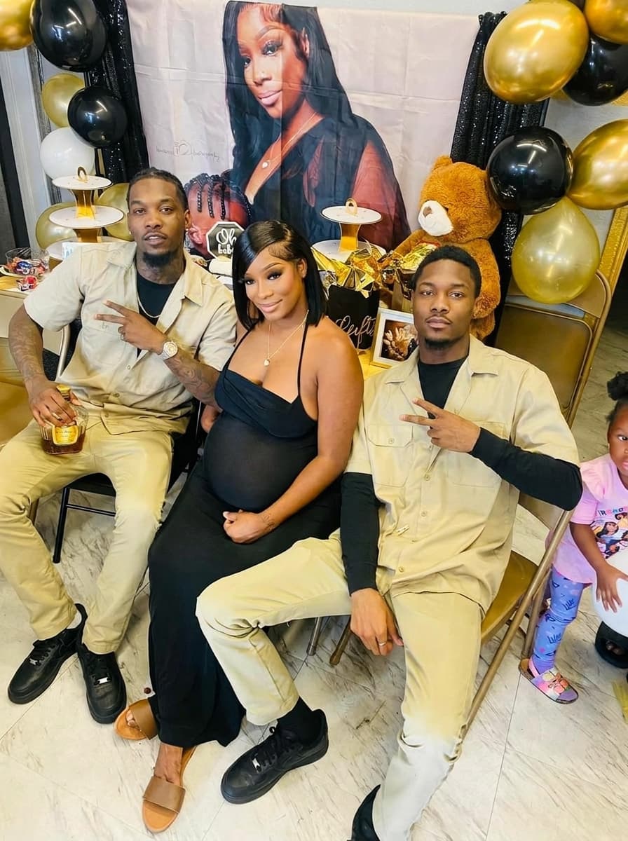 Completely remove and replace the people in this photo with offset as the man on the left and steffon diggs as the man on the right as the man and cardi b as the woman . make sure to remove all tatoos and headwear make it look ultra clean and make sure all of their body matches the skin tone of who they are. keep them in the same outfits as the original. make sure that the end result has cardib as the woman. also change the photo in the packground to be off cardi b