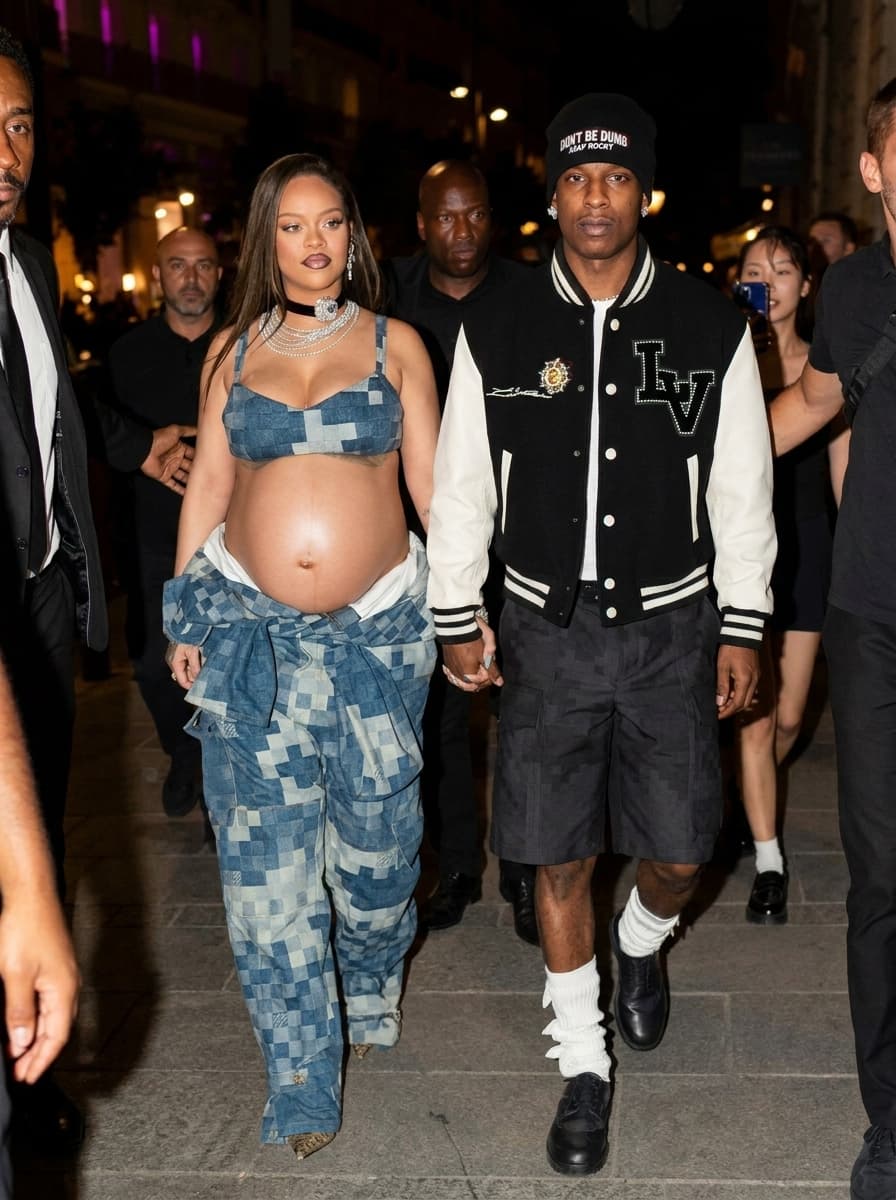 Completely remove and replace the people in this photo with 21 savage as the man and latto as the woman. make sure to remove all tatoos make it look ultra clean and make sure all of their body matches the skin tone of who they are. keep them in the same outfits as the original. make sure that the end result has latto as the woman