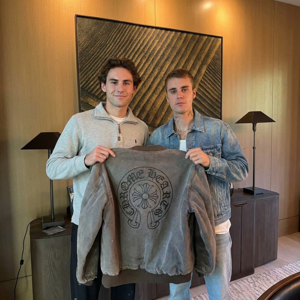 This is me on the left and the photo on the right is the unspo of what I want you to create me. Put me and Justin Bieber in that picture holding the jacket.
