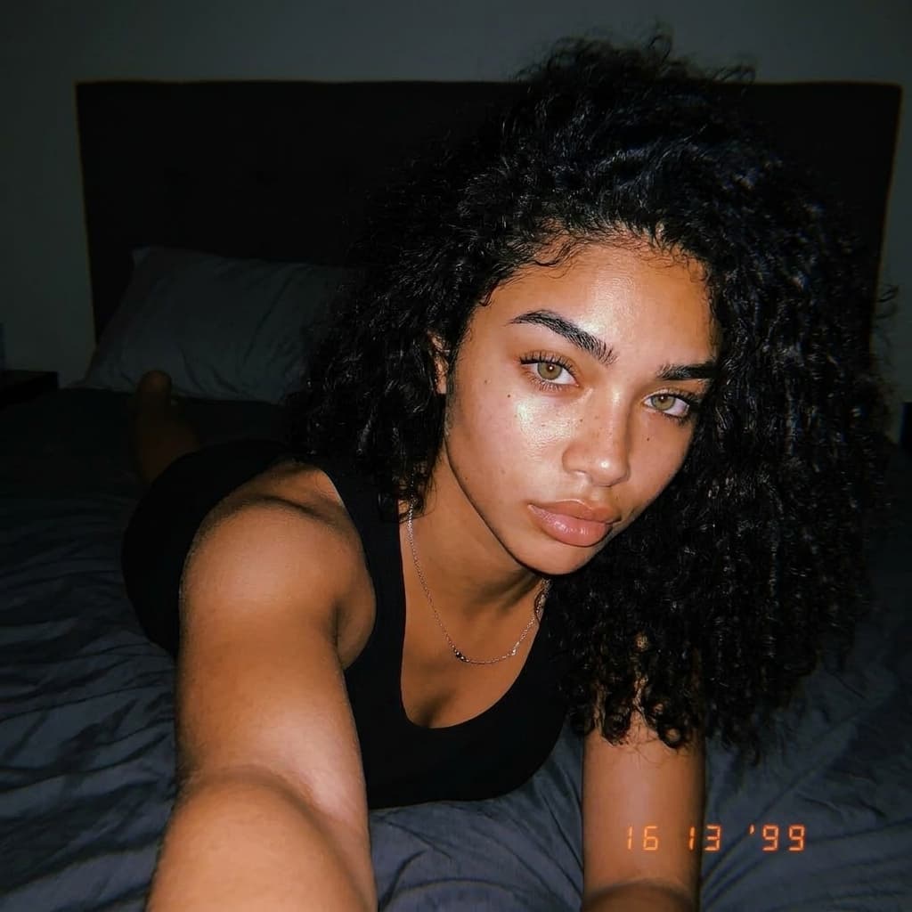A unique and cultivating complexed mixture combination of these females phenotypes at maximum facial & body Aesthetics looks face width at perfection from a selfie facing down on a bed like snapchat not to perfect of a background it can be dark for the more realism look take references from Pinterest 