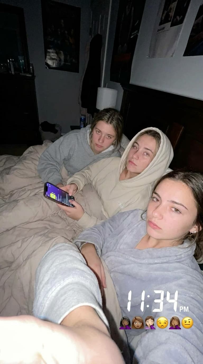 Make a unique combination of these females on a bed selfie like Snapchat baddies upward postion while she laid back in bed with a darker background quality can be little shaky but clear like a realistic bed selfie would b but nonchalant expression 