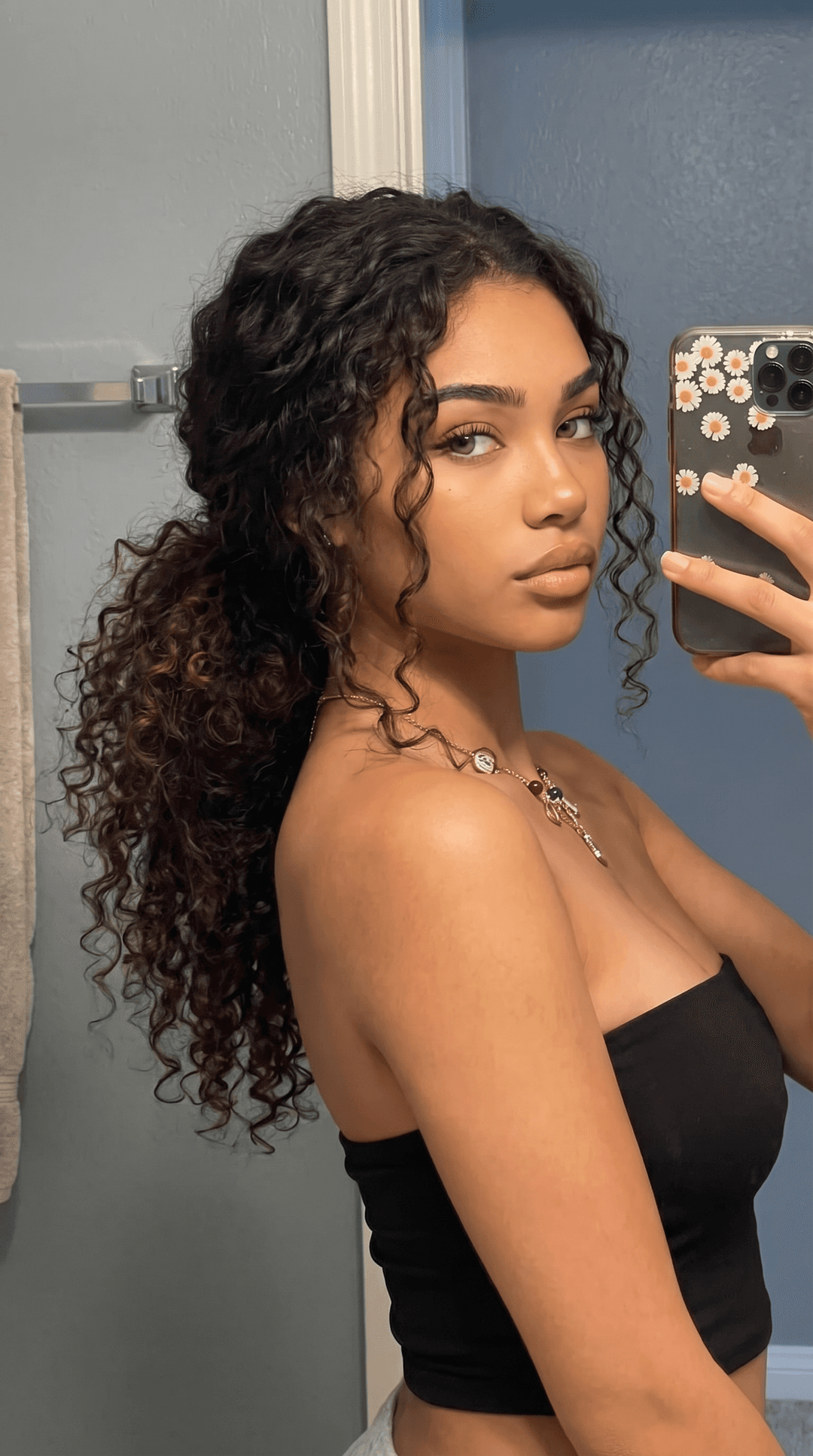 Make a unique combination of these females but in selfie postion like the white female is she's in the Mirror like that female is in same position but the mixture of the females in portrait 