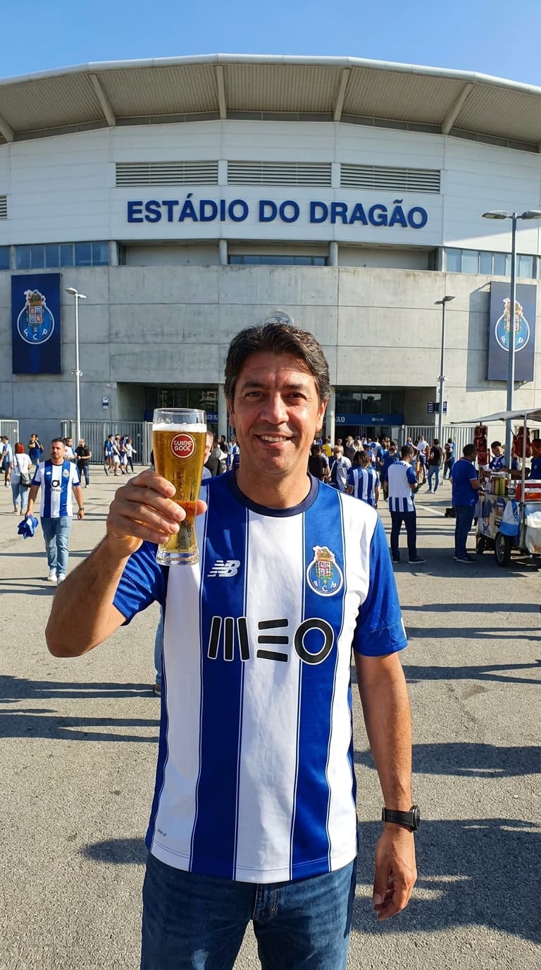 Create an image of the Benfica president wearing a FC Porto jersey, drinking a Super Bock beer in front of the Estádio do Dragão. 