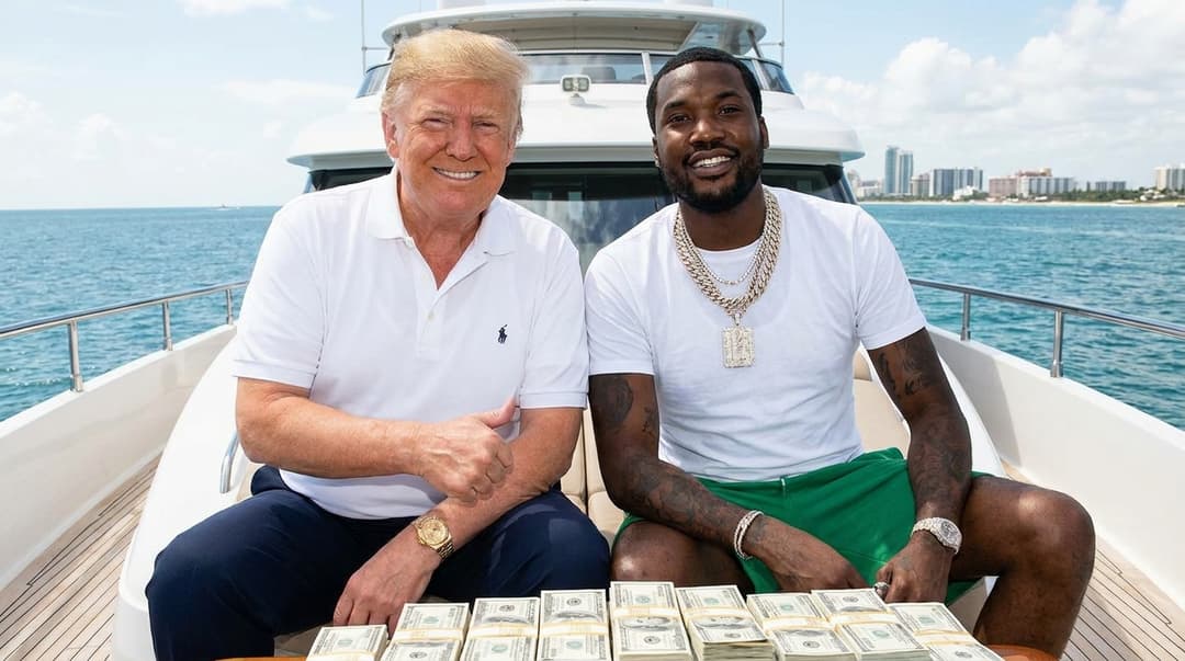 Donald trump on a yet with money and a watch and chains with meek mill