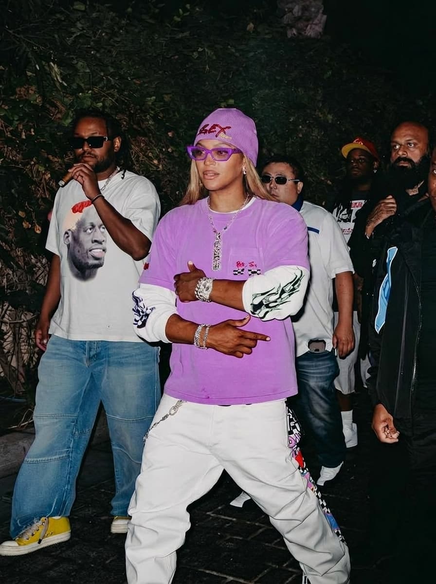 Use the provided image as the base reference. Maintain the exact same environment lighting, camera angle, pose, outfit structure, and composition from the original image.
Replace the original subject with BeyoncÃ©,Music Icon wearing outfits attached
