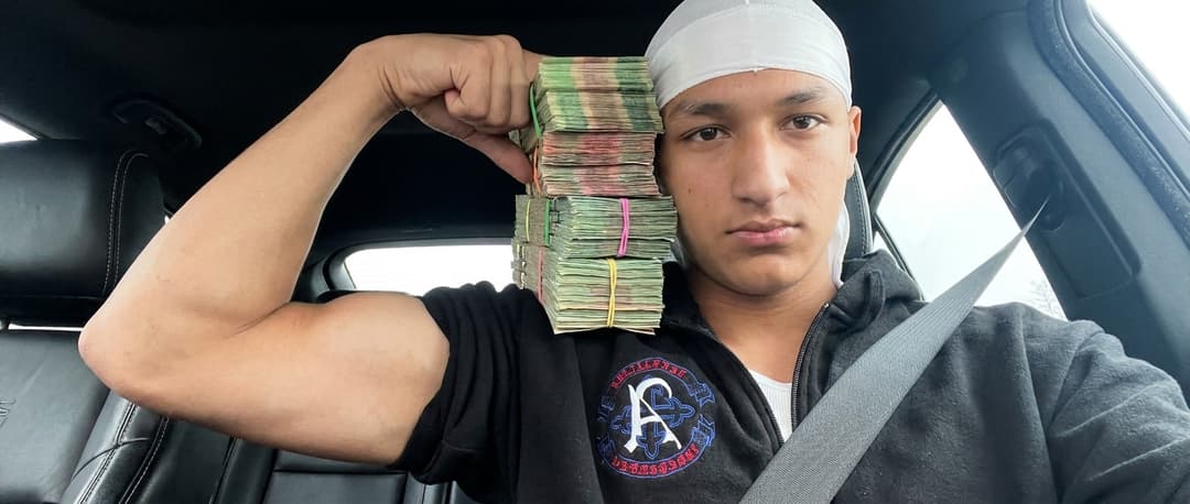 Make me holding this stack of cash by my head flexing